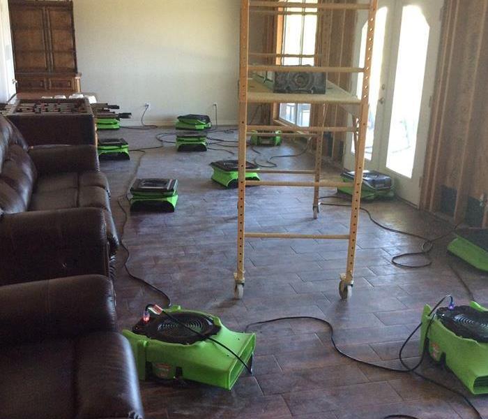 living room, tile floor, scaffold and green equipment